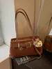 Bolso de axila versátil de moda transfronterizo para mujer, bolso de mano de alta gama, nuevo bolso simple estilo coreano 2026 para el día a día