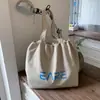 Bolsa de Ombro Estilo Preguiçoso Transfronteiriça Estampada Bolsa Tote de Grande Capacidade Cor Doce Bolsa de Lona Feminina Bolsa de Tecido Bolsa de Braço