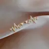 Pendientes de Electrocardiograma de Venta Caliente Transfronterizos, Cobre Ecológico, Pendientes Sencillos de Estilo Corazón Nicho, Lujo Ligero, Pendientes Versátiles