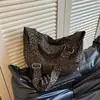 Bolso de hombro versátil con estampado de leopardo transfronterizo, nuevo modelo otoño 2026, bolso tote retro de alto valor estético, bolso tipo dumpling casual y elegante