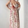 Verano 2026 Nuevo Estilo Transfronterizo Europeo y Americano Comercio Exterior Ropa de Mujer Sexy y a la Moda Estampado Revela Cintura Hueco Vestido de Tirantes