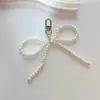 Chique Coreano Novo Estilo Doce Laço de Pérola Coração de Prata Pingente Chaveiro de Carro Charme para AirPods Acessório de Celular