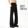 Pantalones sencillos de color liso para hombre, de caída suave, para otoño, estilo americano, casual, adelgazantes, que alargan las piernas, ligeramente acampanados, modernos