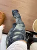 Carpa Tide en stock Patrón de junta de bambú Hoja curva Jeans Mujer Otoño/Invierno Nuevo Holgado Adelgazante Pierna recta Buena caída Pantalones de pierna ancha hasta el suelo