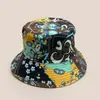 Nuevo estilo exótico patrón de combinación de colores sombrero de pescador para hombres y mujeres retro para viajes protector solar de doble cara personalidad sombrero cubo venta al por mayor