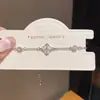 Pulsera Flor de Circonita Chapada en Oro Real de 18K Moda Europea y Americana Ropa de Trabajo Pulsera Versátil Lujo Accesible Joyería de Mano de Alta Gama para Mujeres