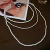 Colar longo vintage floral com pérolas e cravejado de diamantes, corrente elegante para suéter estilo francês, luxo leve e de alta qualidade, acessório versátil