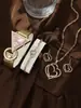 Moda Venta Caliente Escala Romana Esfera Redonda Correa de Acero Reloj de Cuarzo Collar de Negocios Aretes Anillo Pulsera Traje