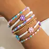 Elegante y moderno set de pulseras de cuentas con bloques de color. Pulseras elásticas con cuentas estilo bohemio con diseño en capas
