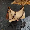 Bolsa de Ombro Feminina Estilo Novo Outono/Inverno 2025 Simples e Fashionable Bolsa Baguette de Axila Bolsa de Mão Casual para o Dia a Dia