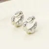 Brincos de Clipe Perfurados Retro Franceses para Mulheres Metal Forma de C Geométricos Assimétricos Argola Torcida Prata Atacado Transfronteiriço