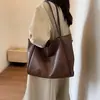 Bolso de mujer de gran capacidad 2026 nuevo diseño de moda, bandolera simple, popular este año, bolso de hombro tipo tote texturizado para el trabajo