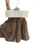 Dulce Pequeño¡El ajuste es súper bueno! Pantalones de pierna ancha a cuadros vintage de otoño estilo coreano para niñas, pantalones modernos y de moda.