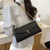 Bolso pequeño de alta gama transfronterizo para mujer, nuevo bolso de moda retro con cadena para el hombro, versátil para el trabajo, moderno bolso de hombro y cruzado
