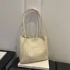 2026 Otoño Temprano Nuevo Bolso de Hombro Individual Versátil Tejido de Gran Capacidad para Mujer Bolso Tote Casual para el Trabajo al Aire Libre Venta al por Mayor de Bolsos para Mujer