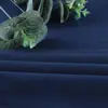 Rpet Poliéster Completo Sarga Piel de Durazno Tela de Poliéster Tela para Ropa Gabardina Ropa de Trabajo Tela de Forro para Bolsas