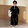 Conjunto para Niños Primavera 2026 Nuevo Estilo Coreano Pequeño Caballero Sudadera Infantil Fresca y Elegante Ropa Deportiva de Primavera y Otoño para Niños