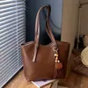 Bolso de hombro tipo tote de gran capacidad transfronterizo, nuevo diseño de moda 2026, elegante y minimalista, de color liso
