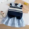 Conjunto de Niña 2026 Verano Nueva Moda Chaleco de Punto Polo y Falda Corta a Cuadros Conjunto de Dos Piezas Estilo Moderno