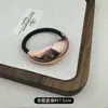 Viento frío doble tubo semicircular hebilla para coleta anillo para el pelo moda red social cuerda para el pelo aleación sin costuras banda de goma nuevo