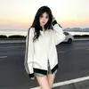 Chamarra sudadera con bloques de color a rayas estilo academia con cuello alto para hombre y mujer, marca de tendencia otoño e invierno 2026, cárdigan casual con cremallera para pareja