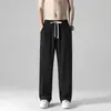 Pantalones drapeados para hombre primavera negro pantalones de traje para hombre holgados rectos trapeador versátiles verano delgados pantalones casuales