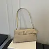 Moda Commute Estilo Coreano Cor Sólida Feminina 2026 Fivela Moda Casual Grande Capacidade Exquisita Baguete Ombro Único Bolsa de Ombro