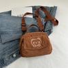 Bolso bandolera de primavera para mujer 2025 Estilo universitario Bolso de mano para niña Solapa Cierre de cremallera Retro Cartero Bolso de hombro Nicho
