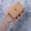 Carteira Feminina Transfronteiriça com Zíper e Fecho 70% de Desconto Estilo Curto Multifuncional Bolsa de Mão Fashion com Múltiplos Porta-Cartões Porta-Cartões Clutch