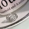 Anel Versa com linhas geométricas cruzadas e design de nicho, banhado a ouro, com zircônia microincrustada, pulseira minimalista enrolada de personalidade