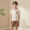 Conjunto Novo de Pijama Color Block com Gola Redonda para Homens e Crianças Verão 2026 Conjunto de Shorts de Manga Curta em Liocel para Adolescentes