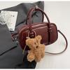 Bolsa de Bolos Retro Coreana de Venta Caliente para Otoño e Invierno para Mujer 2026 Nueva Bolsa de Hombro Cruzada Simple Versátil