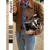Ropa de Trabajo Casual Transfronteriza Europea y Americana Chaqueta de Manga Larga de Color Puro con Botones para Mujer Otoño e Invierno 2025 Top Versátil Retro