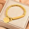 Pulsera Redonda de Marca Transfronteriza Europea y Americana de Acero Inoxidable Codo Frijol Dorado Pequeño Pulsera de Cuerda Elíptica Joyería de Mano Simple para Pareja