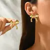 Pendientes de Venta Caliente Transfronterizos en Varios Estilos de Europa y América, Pendientes de Diseño Exagerado de Gama Alta de Círculo Metálico con Forma de Flor en Stock