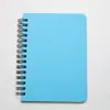 Cuaderno de espiral de papel Kraft tamaño A6 Venta al por mayor de cuaderno de espiral con logotipo imprimible Copia blanda Bloc de notas para estudiantes Cuaderno