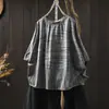 La popular camiseta de manga corta de este año para mujer, nueva moda de verano 2026, holgada y estilizada, top gris de manga murciélago