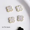 Decoraciones de Trébol de Cuatro Hojas para Uñas, Aleación Iridiscente de Nácar con Borde de Flor, Accesorios Rosas para Uñas al por Mayor, Coloridos