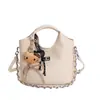 Bolso de Moda Urbano Minimalista con Patrón de Diamantes 2026 Primavera Versátil Nuevo Bolso Cruzado para Mujer para el Trabajo y los Viajes Bolso Cubo
