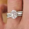 Huitan Atacado Anel de Casamento com Quatro Garras Inlaid Três Conjuntos de Anéis Design de Luxo Acessível Joias Anel de Zircônia Oval para Mulheres