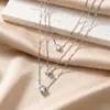 Diseño de Nicho Corazón Estrella Gota de Agua Circonia Collar Apilado de Tres Capas para Mujer Gargantilla Versátil Joyería Transfronteriza Venta al Por Mayor