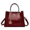 Comercio Exterior 2025 Nuevo Bolso de Mano de Moda de Charol de Alta Gama Bolso Cruzado de Hombro Portátil Simple para Salir para Mujeres