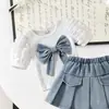 Comercio Exterior Traje de Falda de Mezclilla con Lazo para Niños Mangas Abullonadas Manga Corta Falda de Mezclilla Plisada Conjunto de Dos Piezas Fábrica de Origen