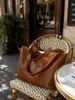2026 Nueva Bolsa Tote Grande de Cuero Suave Marrón para Mujer, Maletín de Lujo Ligero de Nicho de Gama Alta para Tableta