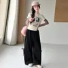 Conjunto de Camiseta Base Rayada de Dibujos Animados para Niñas 2026 Primavera y Otoño Nuevo Conjunto de Dos Piezas de Moda con Camiseta Falsa de Dos Piezas y Pantalones de Pierna Ancha