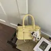 Bolso de Mano Cuadrado Pequeño de Moda Transfronterizo para Mujer 2026 Nuevo Exquisito Estilo Coreano Moderno Informal Bolso de Hombro y Bolso Cruzado para Mujer
