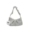 Bolso de mujer 2026 nuevo popular bolso de axila, bolso nube de alta gama, bolso pequeño cruzado de un solo hombro plisado texturizado de nicho