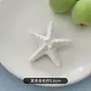 Pinza para el pelo de estrella de mar simulada para niñas, pasador lateral, accesorio para el pelo de pico de pato para la playa para niñas dulces y geniales, accesorio para el pelo de verano al por mayor