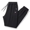 Pantalones casuales de hombre de venta caliente transfronterizos en stock, pantalones finos de primavera/verano tobilleros recortados, pantalones tipo harén versátiles y adelgazantes