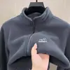 Venta al por mayor de fábrica de chaquetas cálidas de forro polar, nueva colección otoño/invierno 2026, sudaderas de forro polar para hombre, cárdigan con cuello alto para exteriores